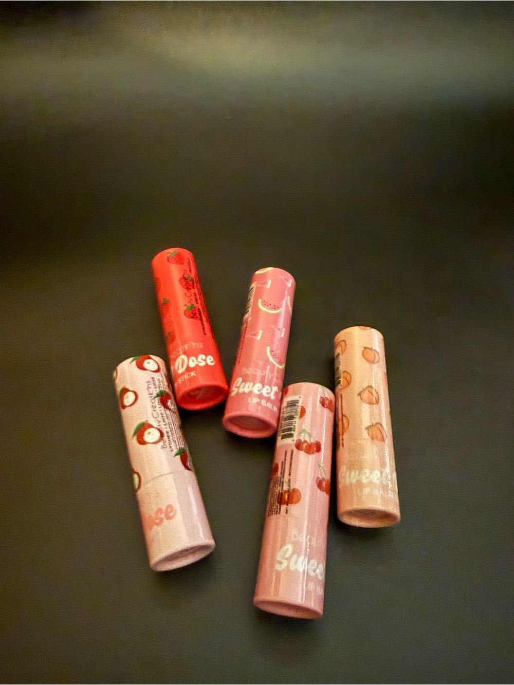 Beauty Creations Fruit-Themed Lip Balm Set — Pink & Red Tubes